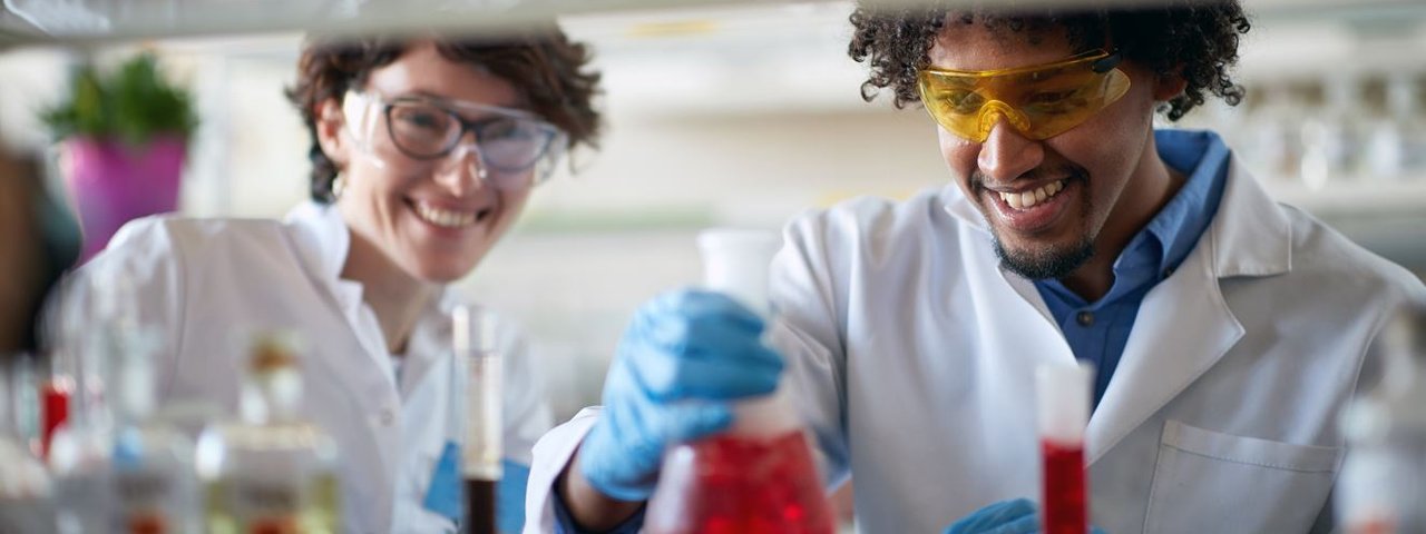 Colleagues working in laboratory